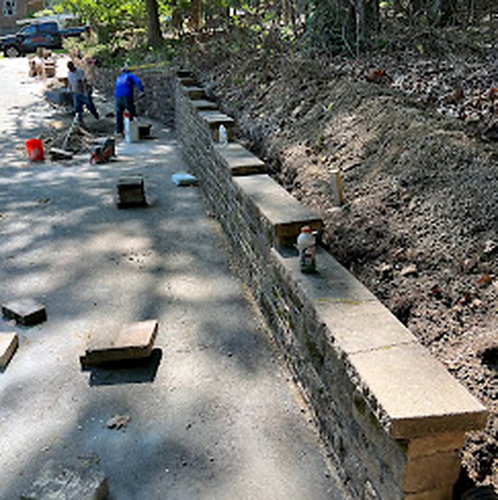 Stone retaining wall construction by 1 All American Roofing LLC in Central NJ