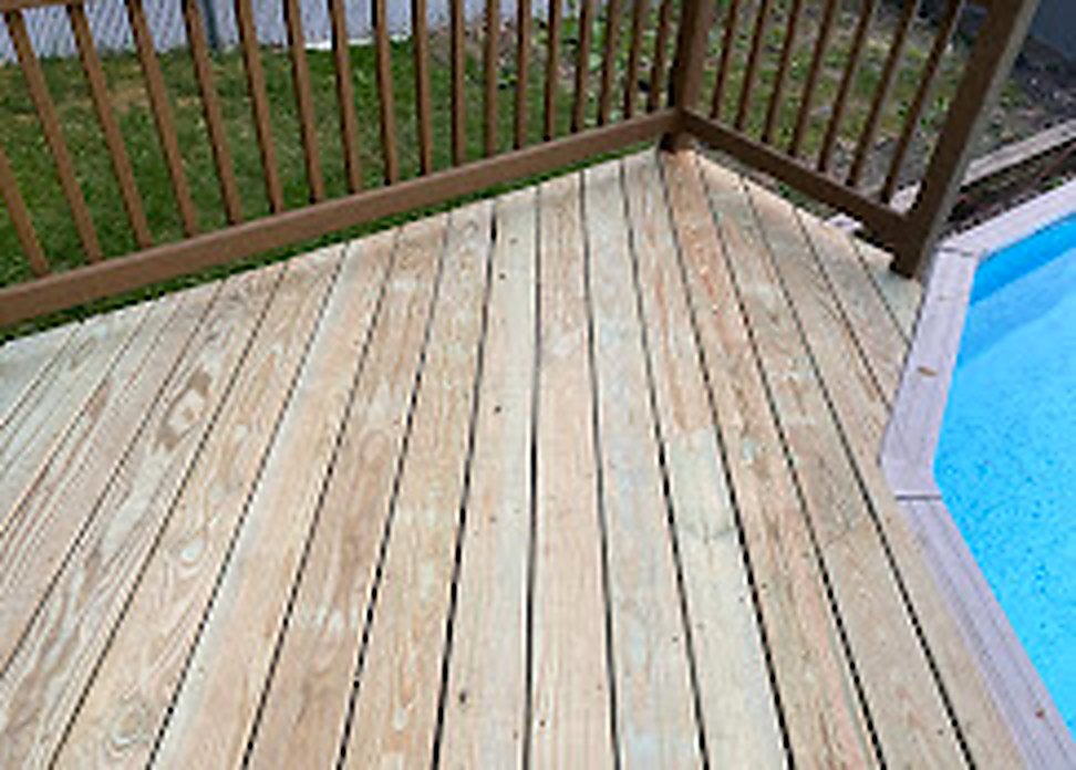Wood pool deck construction in NJ backyard