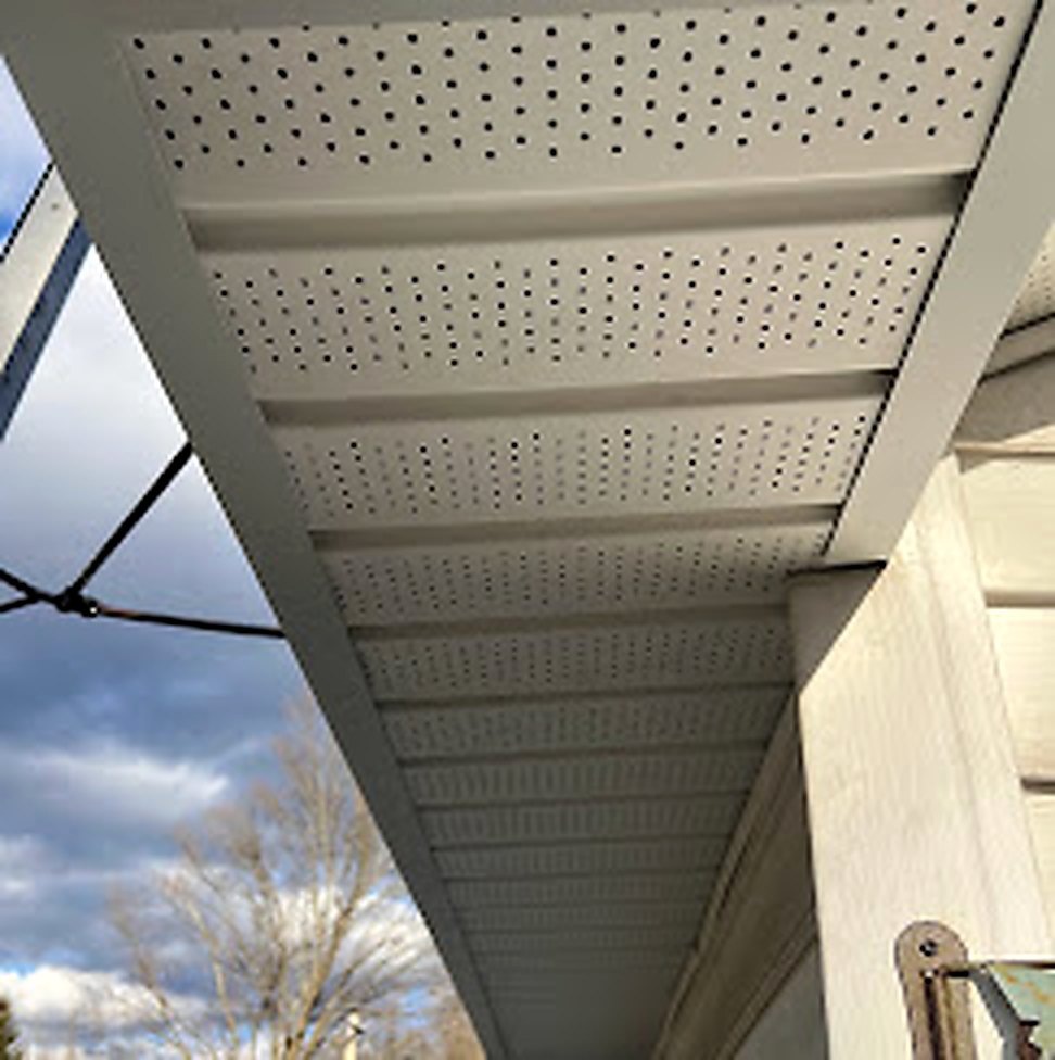 New white vented vinyl soffit installation