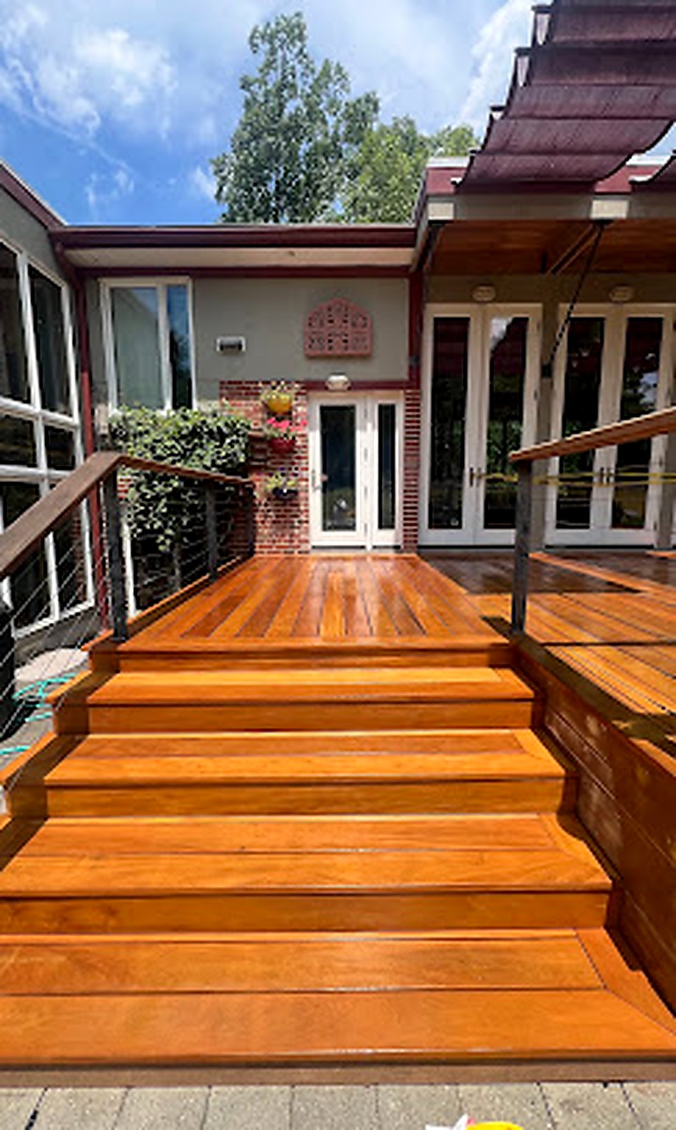 Custom red mahogany hardwood deck with steps